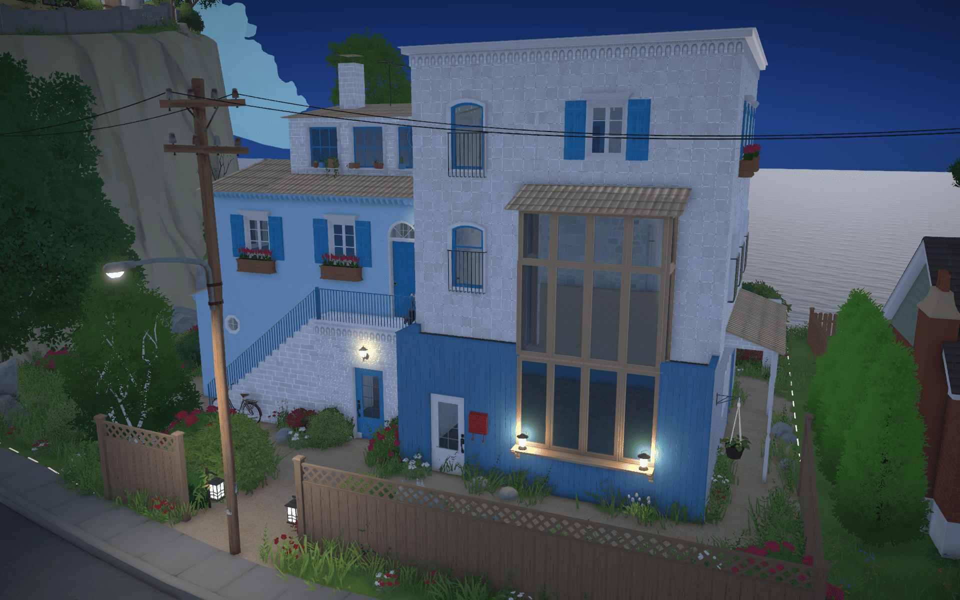 Mediterranean blue house next to the beach image 10