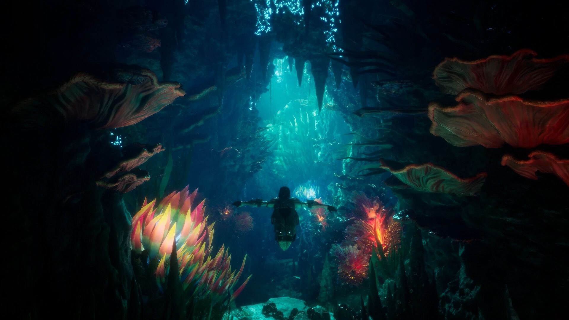Swimming through an underwater cave of glowing plants