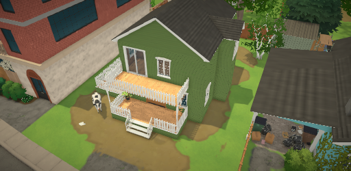 Une maison verte qui trainait dans l'herbe