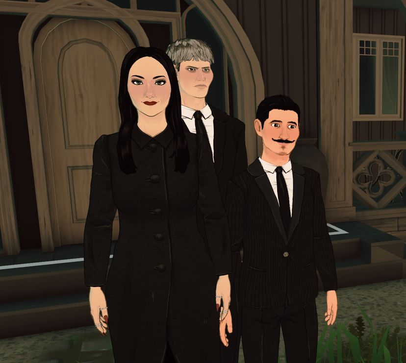 Morticia and Gomez Addams (and Lurch)